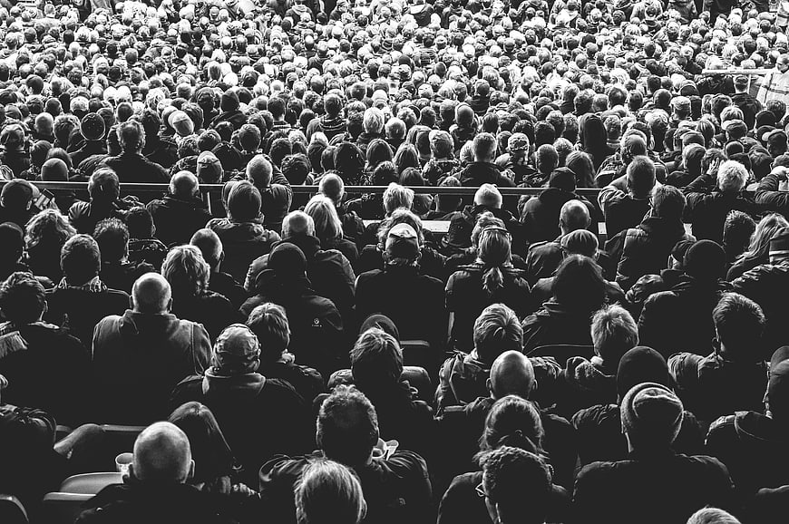Black and white crowd of spectators in stadium
