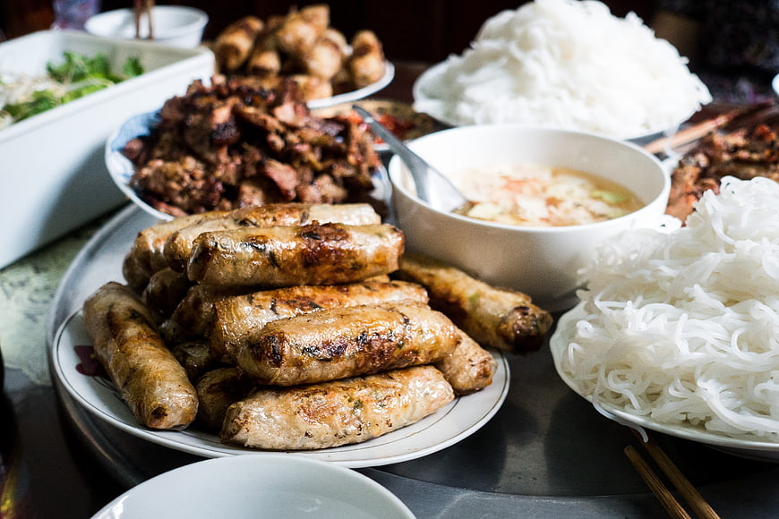 Vietnamese grilled pork sausage and rice noodles feast
