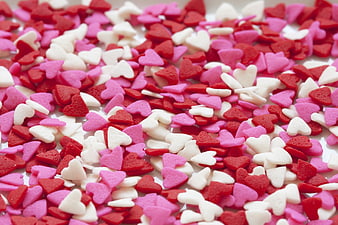 Red, Pink, and White Heart Sprinkles Background