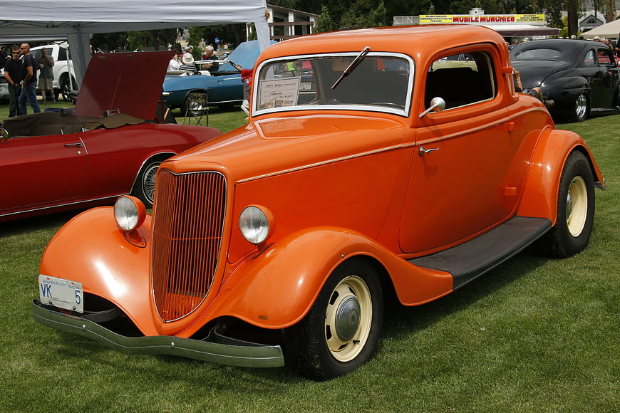 Vintage Orange 1930s Coupe at Outdoor Car Show
