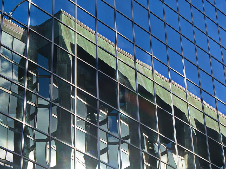 Modern Glass Building Facade with Reflections