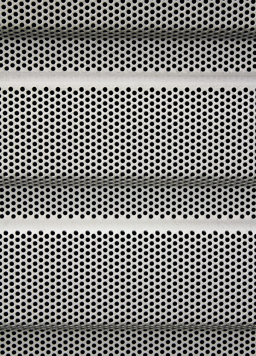 Perforated Metal Sheet Texture Background