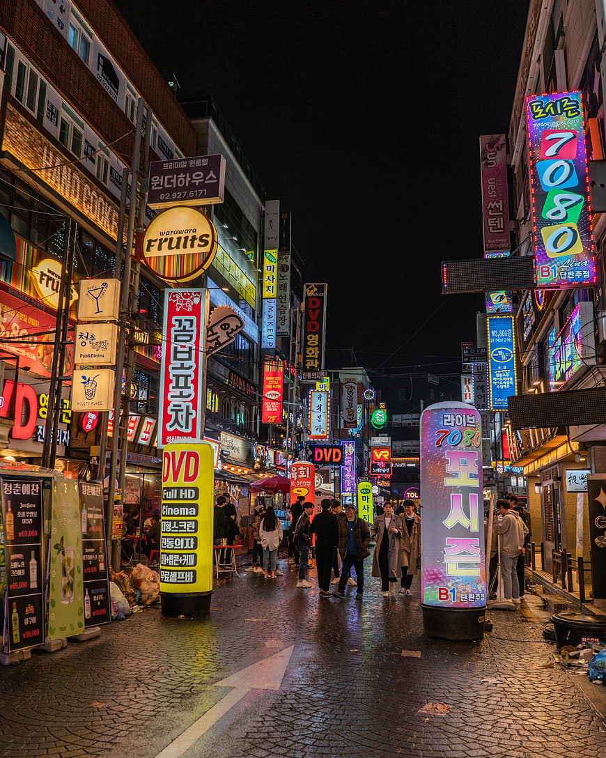 Vibrant Neon Street Scene in Seoul at Night