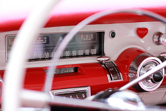 Vintage Red Car Dashboard with Chrome Details