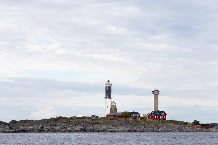 Two Lighthouses on Rocky Island Coastline