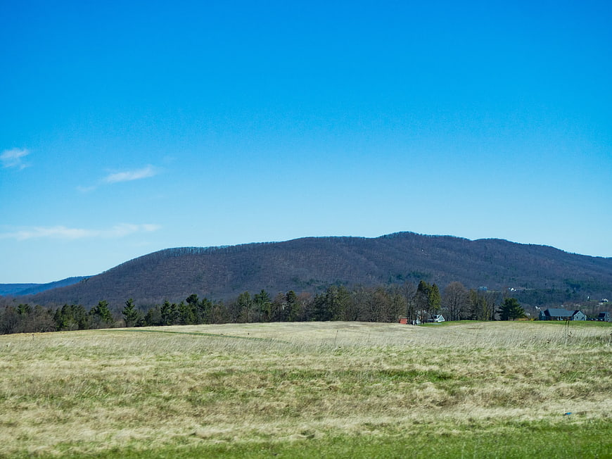 Rural Landscape with Blue Sky and Distant Mountains
