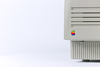 Vintage Apple Computer Corner with Rainbow Logo on White Background