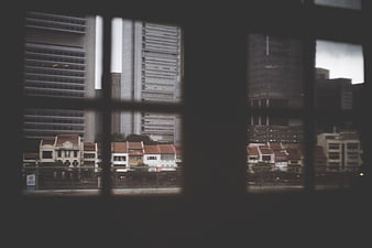 Cityscape View Through Dark Window Frame Silhouette
