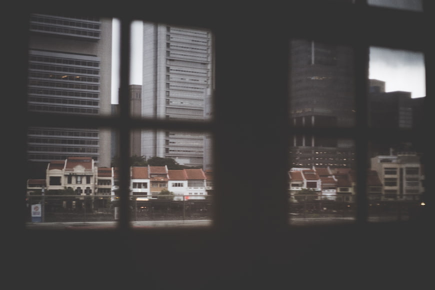 Cityscape View Through Dark Window Frame Silhouette