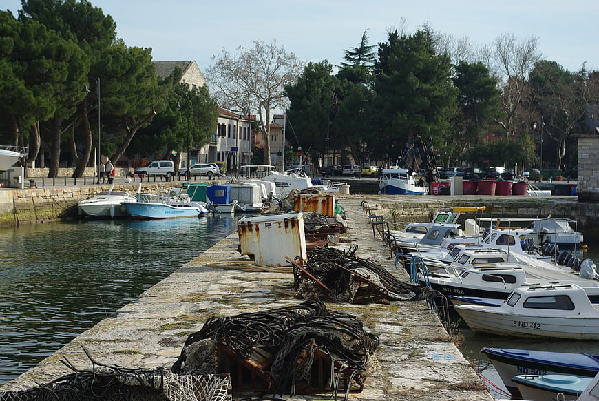 Fishing boats and lobster pots in a Croatian harbor
