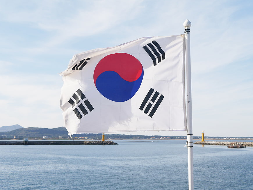 South Korea Flag Waving Over Ocean