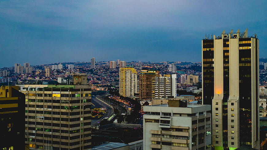 Cityscape at Dusk with Skyscrapers and Traffic