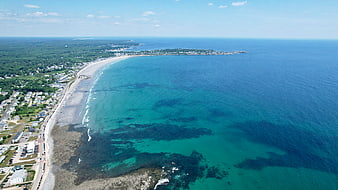 Aerial View of Turquoise Coastline and Sandy Beach