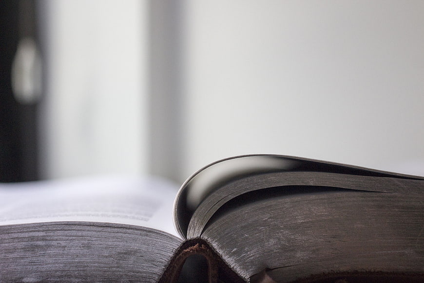 Close-up of Open Book Pages with White Background