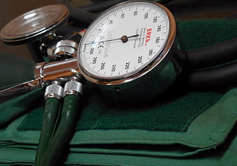 Close-up of ERKA Sphygmomanometer on Green Cloth