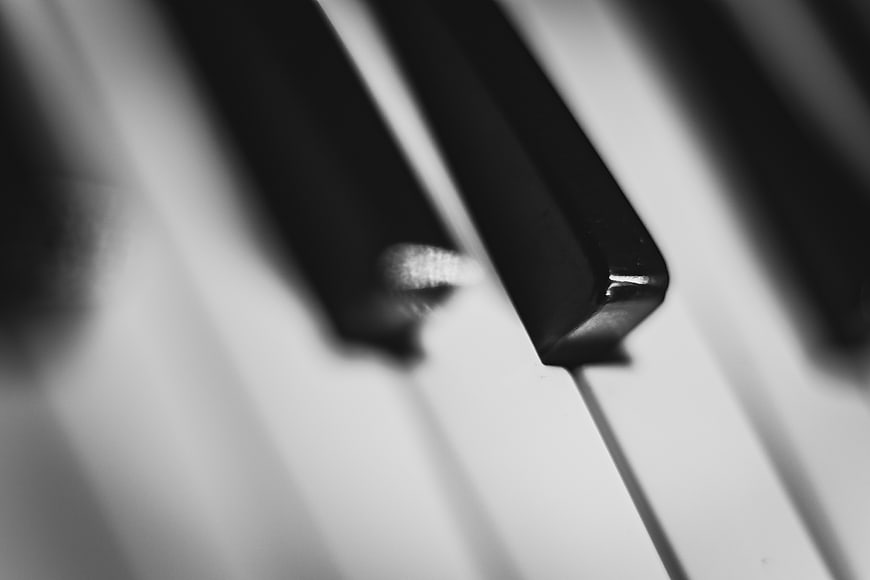 Close-up of piano keys in black and white