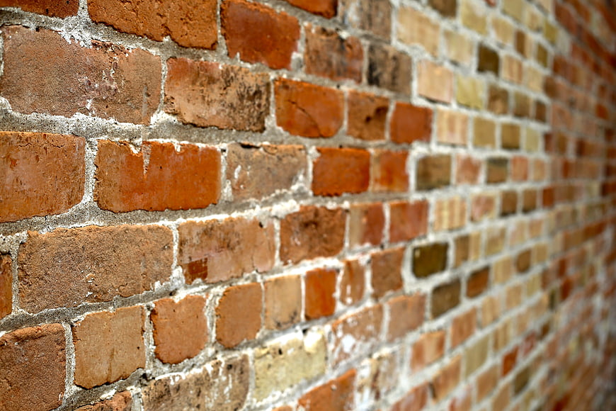 Weathered Red Brick Wall Texture Close Up