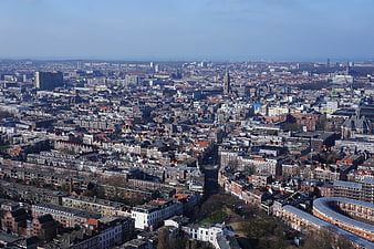 Aerial View of Copenhagen Cityscape with Red Roofs and Church