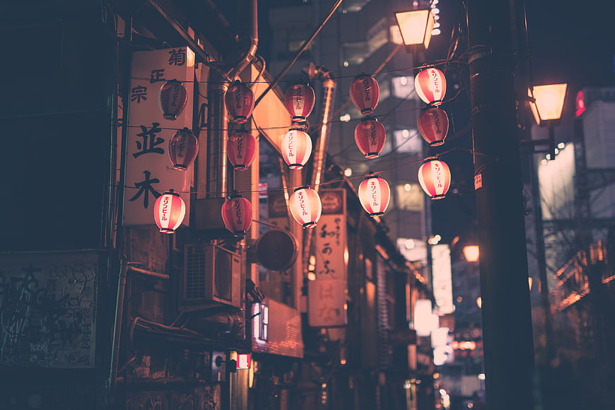 Traditional Japanese Lanterns Hanging on Night Street