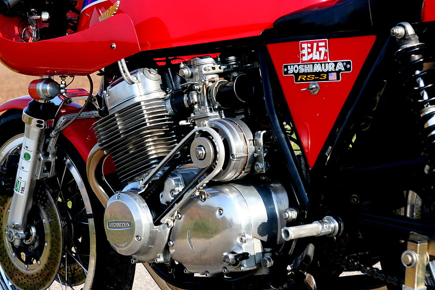 Close-up of Red Honda Motorcycle Engine with Chrome Details