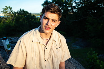 Young Man Making Disgusted Face Outdoors