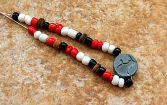 Handmade Beaded Bracelet with Rhino Pendant on Stone