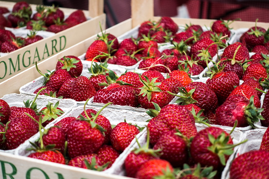 Fresh Red Strawberries in Wooden Market Crates