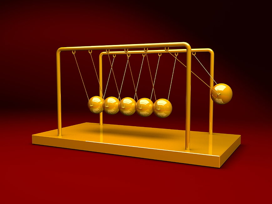 Golden Newton's Cradle on Red Background 3D Render