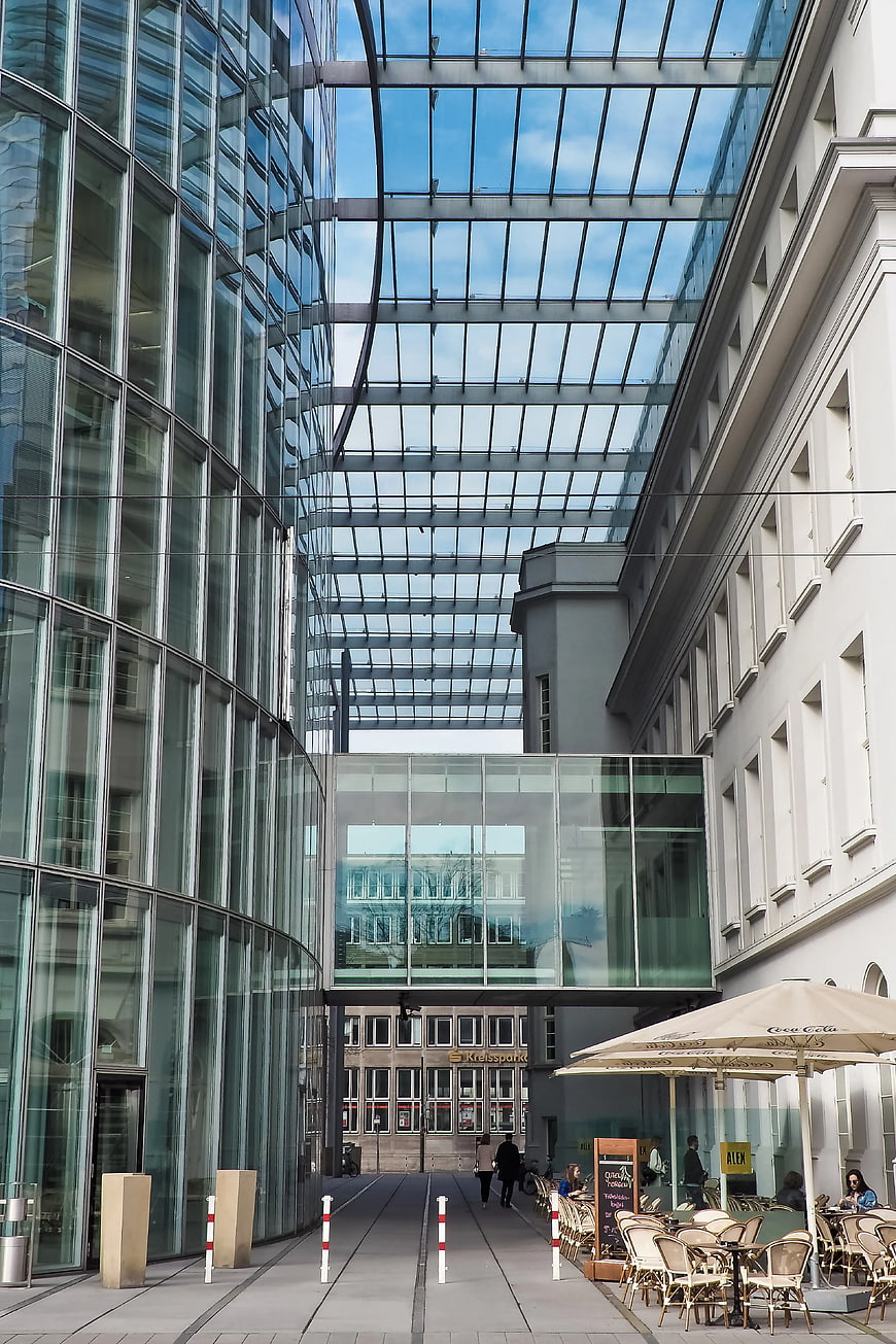 Modern Glass Architecture with Sky Bridge and Cafe