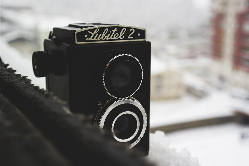 Vintage Lubitel 2 Camera on Snowy Window Sill