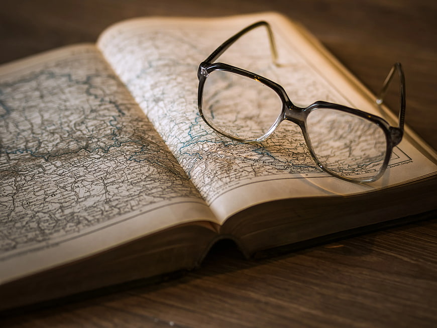Vintage Glasses on Open Map Book