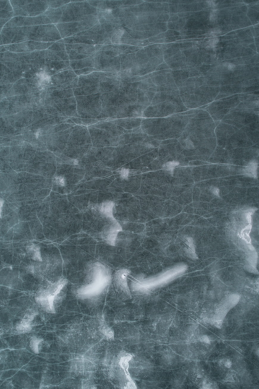 Abstract Blue Cracked Ice Texture Background