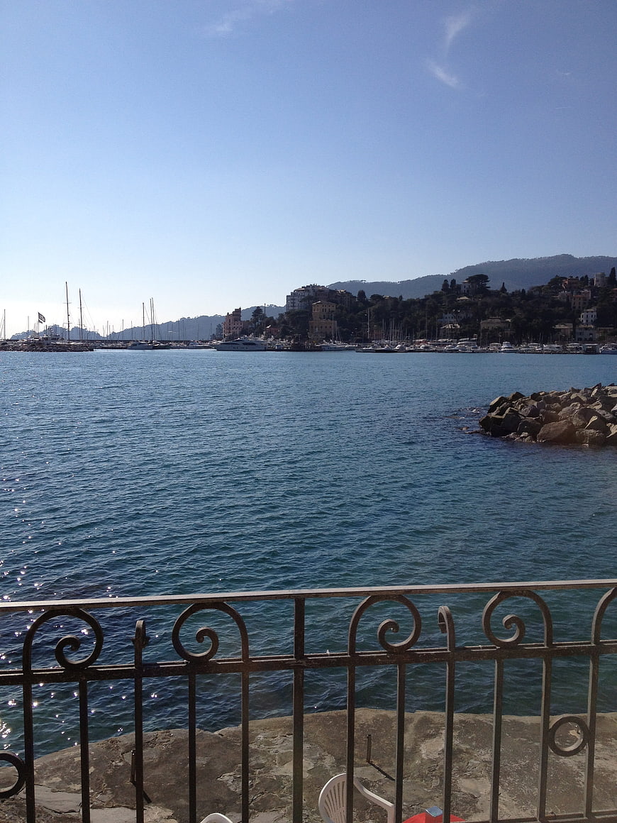 Scenic view of Ligurian Sea harbor with boats and hills