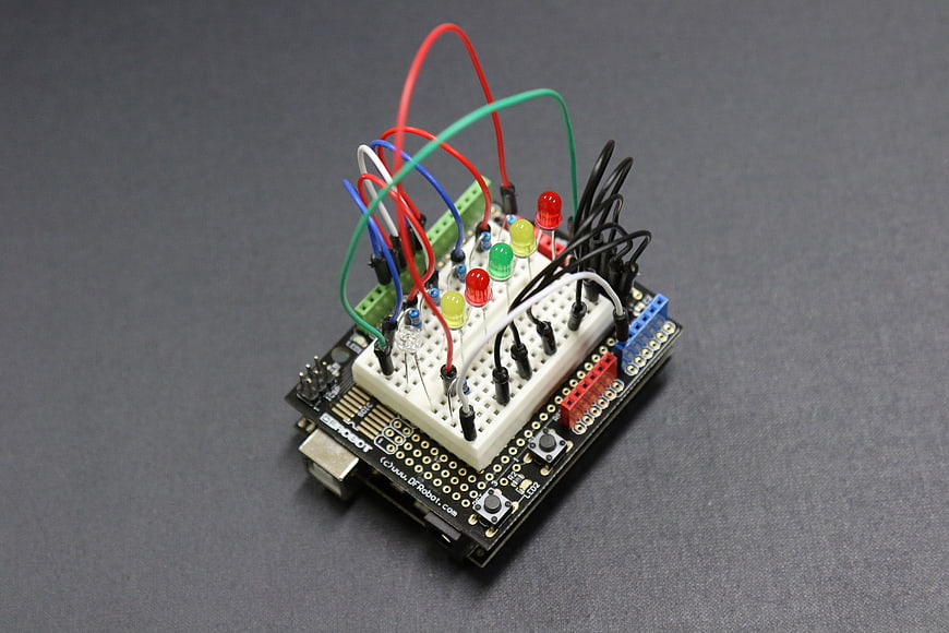Arduino circuit board with breadboard and LEDs