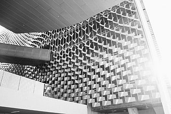 Modern architectural facade with geometric pattern in black and white