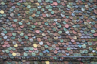 Textured Pattern of Weathered Multi-Colored Roof Tiles