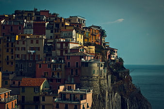 Colorful cliffside village overlooking the sea