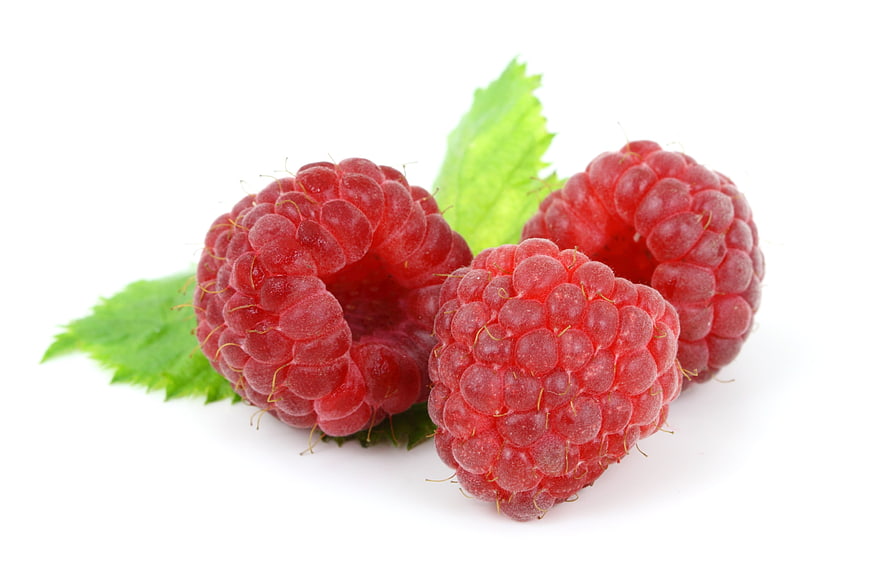 Fresh Red Raspberries with Green Leaves on White Background