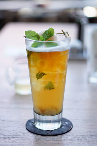Refreshing Iced Tea with Mint and Lemon in a Tall Glass