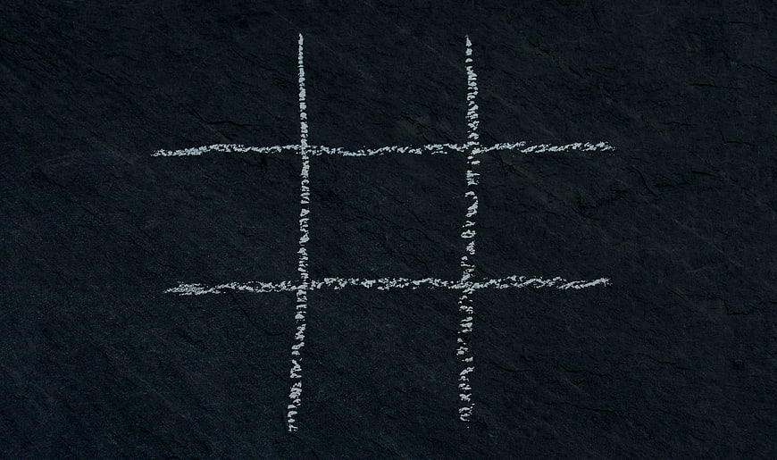 Empty Chalk Tic Tac Toe Grid On Dark Textured Slate Background