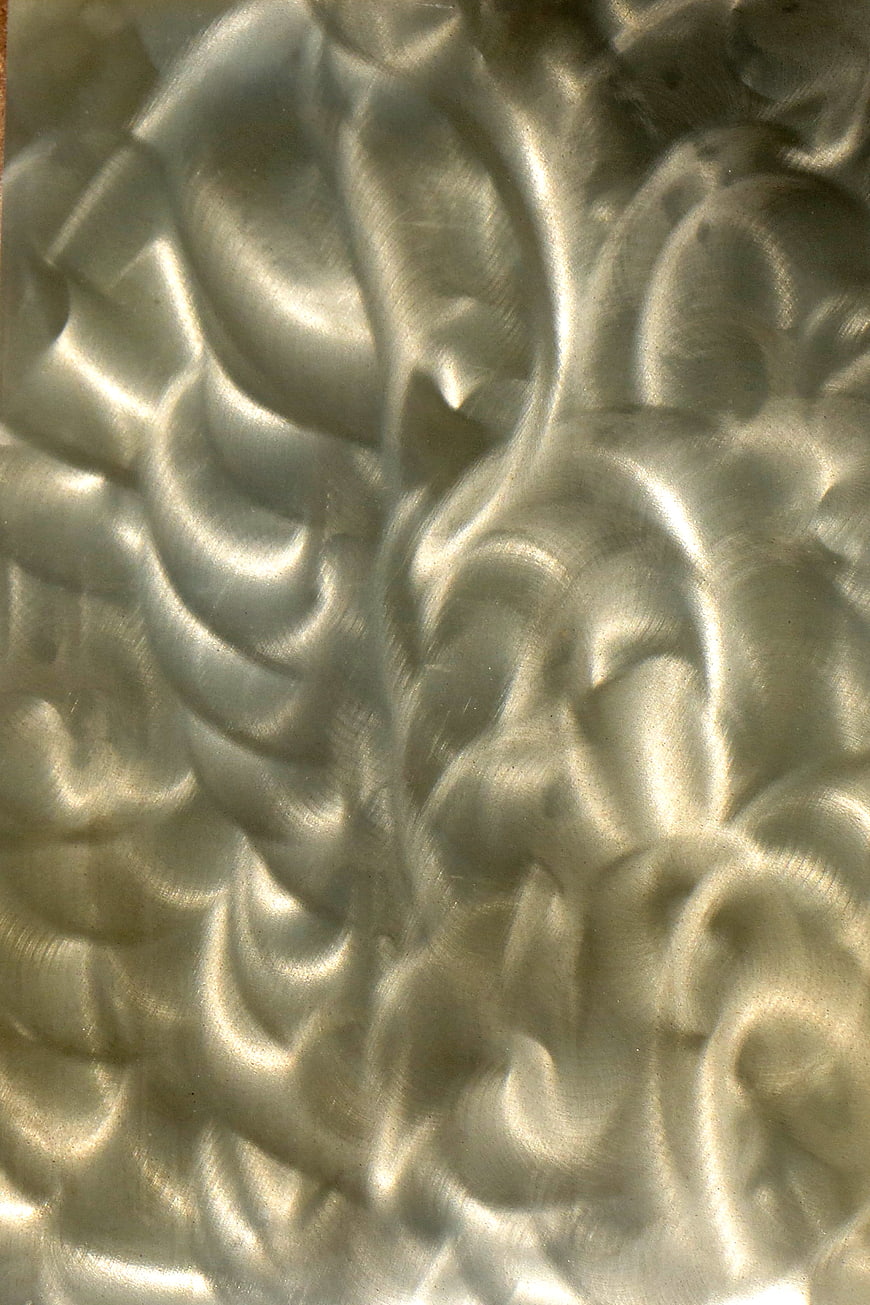 Abstract Silver Metallic Texture with Shimmering Swirls