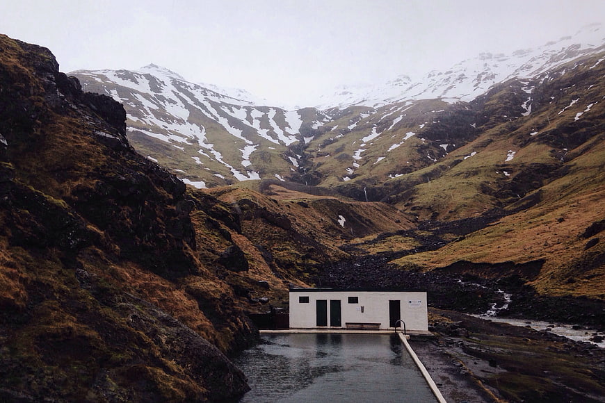 Modern Outdoor Swimming Pool in Icelandic Mountain Valley