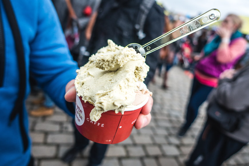 Close-up of Pistachio Gelato in Red Cup with Spoon