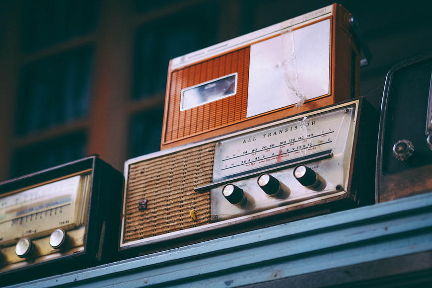 Vintage Retro Radios on Wooden Shelf