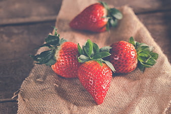 Fresh Ripe Strawberries on Rustic Burlap Cloth