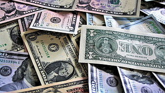 Scattered US Dollar Banknotes Close Up