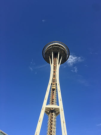 Low angle view of Space Needle against blue sky