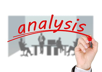 Hand writing analysis on glass with business meeting background