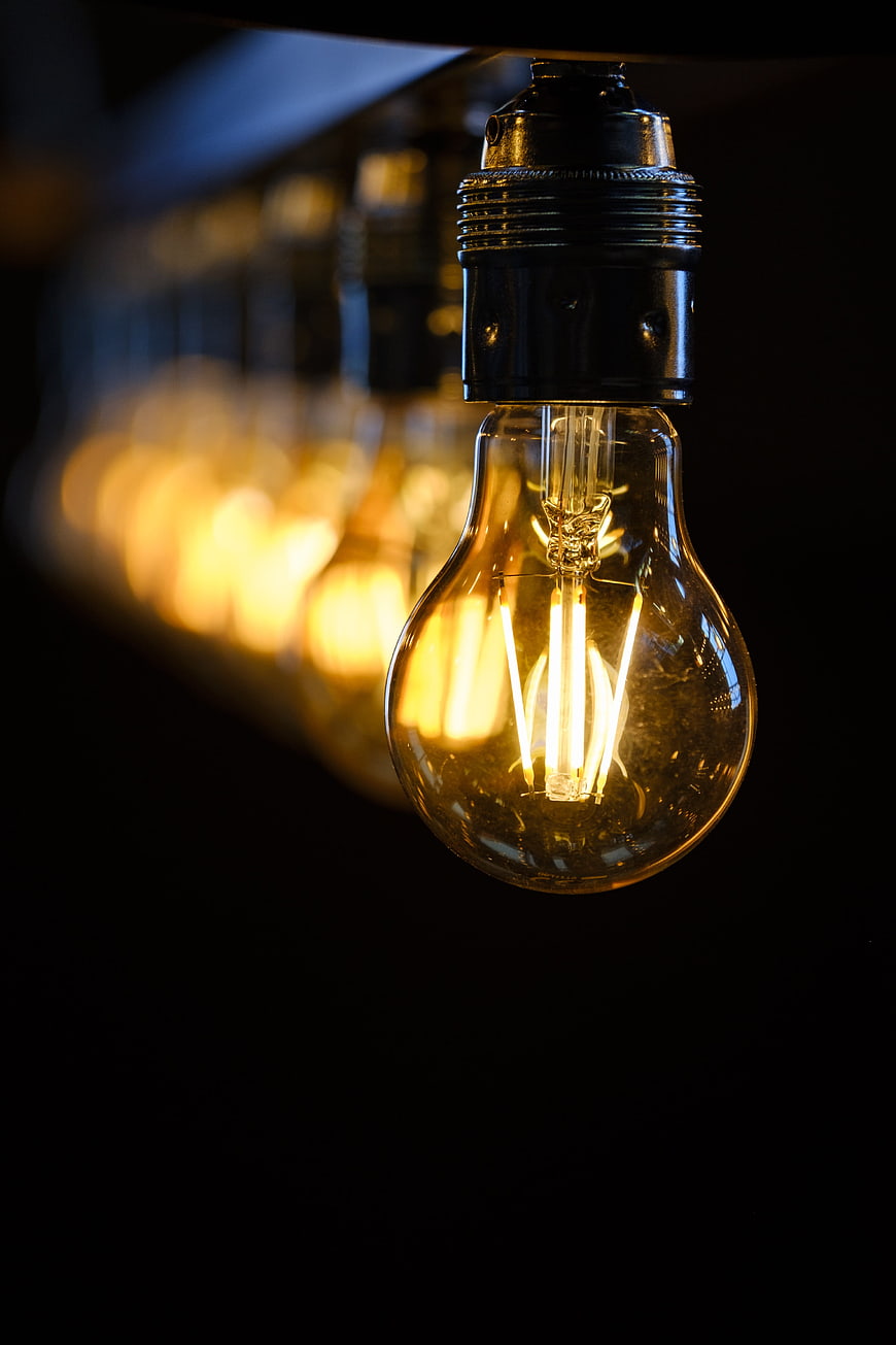 Vintage Edison Light Bulb with Bokeh Background