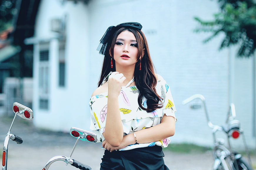 Fashionable Woman with Vintage Motorcycle Handlebars